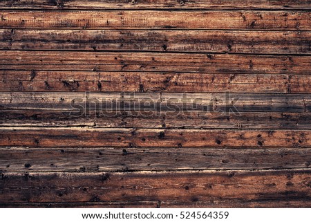 Natural old dirty wooden wall with planks. Grunge wooden wall used as background close
