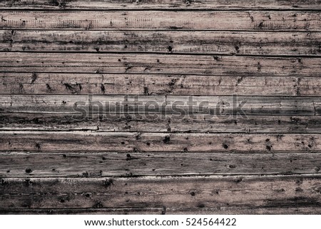 Natural old dirty wooden wall with planks. Grunge wooden wall used as background close
