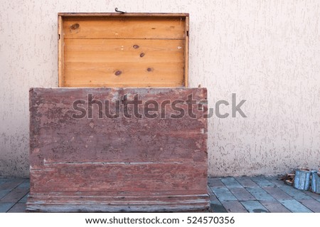 A chest against the wall.