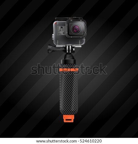 Action video camera 5 for filming extreme sports in waterproof box on floating selfie stick Royalty-Free Stock Photo #524610220