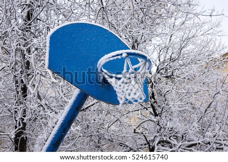 Snow covered basketball hoop