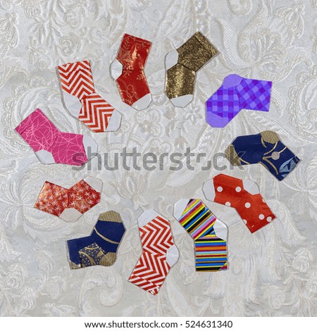 set of cute origami Christmas stocking or socks with color ornament. Merry Christmas greeting card 
