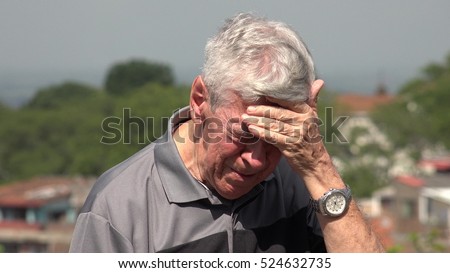 Sad And Tearful Old Man Or Senior Royalty-Free Stock Photo #524632735