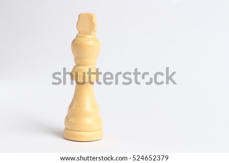Isolated wooden chess white piece, King. 