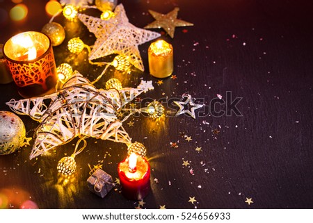 Shiny Christmas decorations against a black background