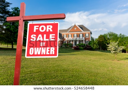 For Sale and Under Contract realtor sign in front of large brick single family house in expansive grass yard for real estate opportunity