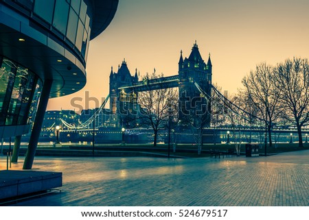 Tower Bridge in London at sunrise , view from Southwark .