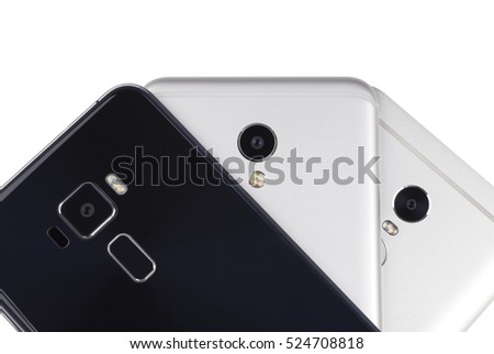 Close up of a Mobile Phone Camera.many smartphones top view isolated on white background.touch id