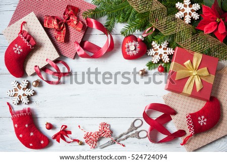 Christmas background, preparation of gift wrapping, package, box, branches of fir and decorations