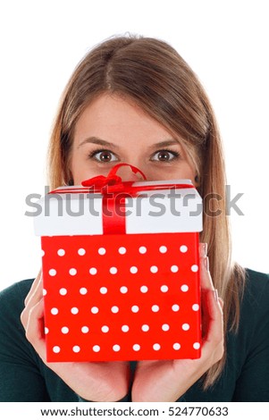 Picture of a woman holding a Christmas gift
