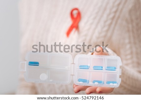 Close up of a pill box filled with medicine