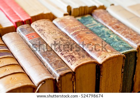 Old books background. Antique manuscripts. Royalty-Free Stock Photo #524798674