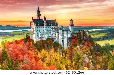 Beautiful aerial view of Neuschwanstein castle in autumn season. Palace situated in Bavaria, Germany. Neuschwanstein castle one of the most popular palace and travel destination in Europe and world. Royalty-Free Stock Photo #524801266