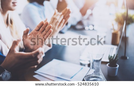 Close up view of business seminar listeners clapping hands. Professional education, work meeting, presentation or coaching concept.Horizontal,blurred background Royalty-Free Stock Photo #524835610
