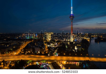 View of Dusseldorf with the illuminated rhine tower at night, germany