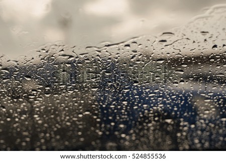 Water drop on glass windows background