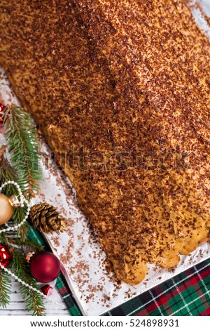 Russian Christmas Monastery Log House Cake (Monastyrskaya Izba). Selective focus.