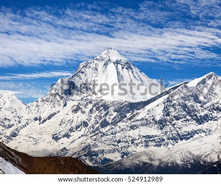 Mount Dhaulagiri, view of mount Dhaulagiri from Thorung La pass with beautiful sky, round Annapurna circuit trekking trail, Nepal Royalty-Free Stock Photo #524912989