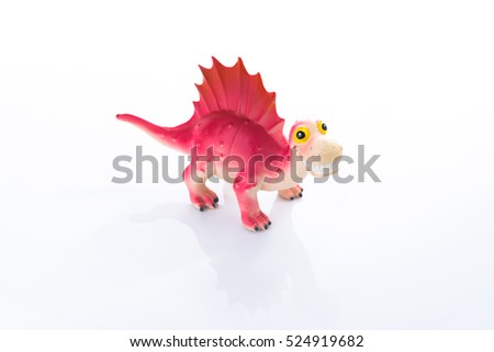Dinosaur Toy Isolated On White acrylic.This is high-key photo