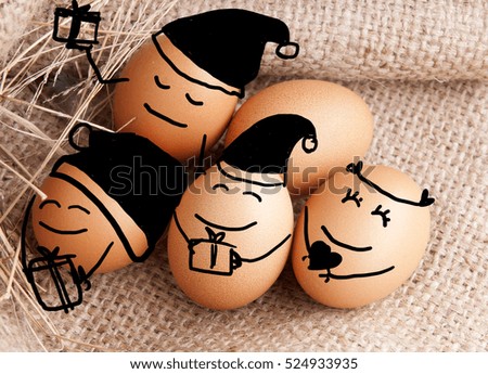 Happy eggs giving gifts for Christmas New year holiday concept.