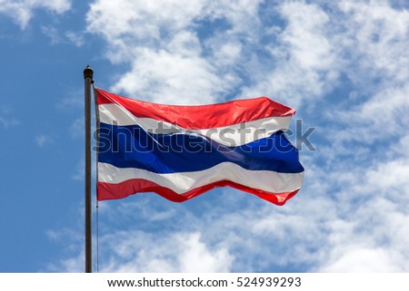 Thailand flag waving in the wind with beautiful blue sky