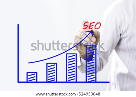 SEO" text with hand of young businessman point on virtual graph Blue line and bar showing on increasing with background -business, finance, salary, crisis, and development concept