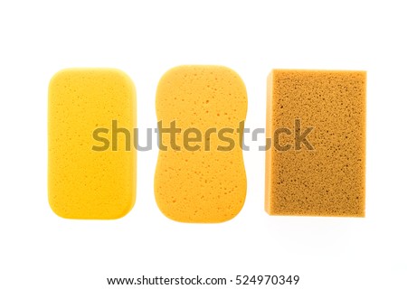 Micro sponge for cleaning and washing car isolated on white background Royalty-Free Stock Photo #524970349