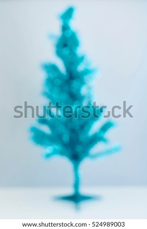 A close up shot of a fir christmas tree blur