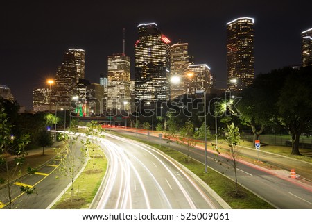 Night landscape with traffic light of Downtown Houston at night or sunset