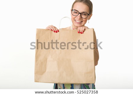 girl with shopping bags on a white background.