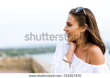 Beautiful young woman profile picture and a fashion stand