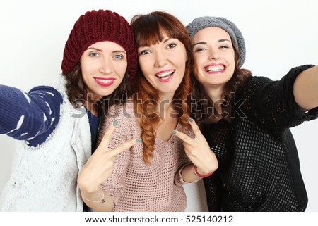 Funny girl doing selfie three. Friendship concept, lifestyle, happiness, emotions.