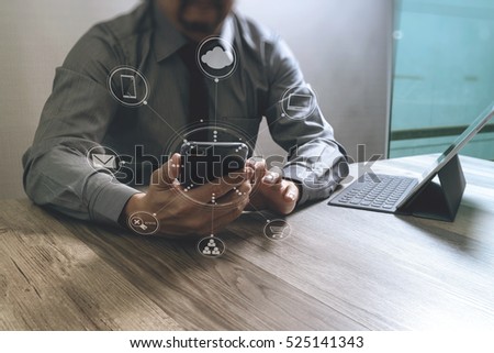businessman Designer hand using mobile payments online shopping,omni channel,Social distancing and Working from home concept.
