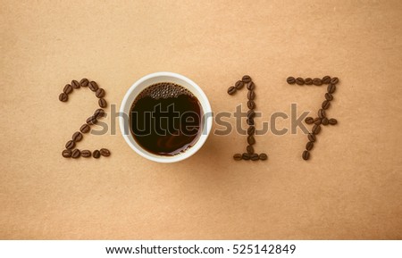 2017 coffee beans on paper texture in vintage style for new year concept