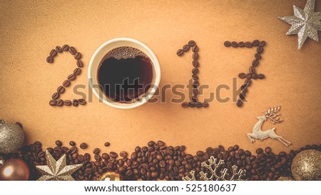 2017 coffee beans and christmas decorations in vintage style for new year concept
