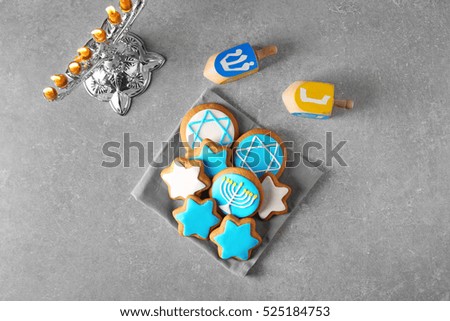 Beautiful composition for Hanukkah on grey table