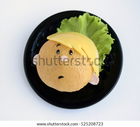 Sandwich in the form of the boy's head. Creative food for good mood and appetite