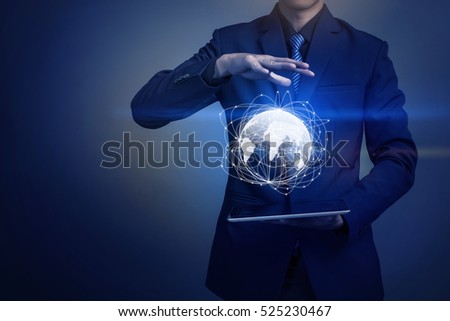 Close up of businessman holding global connection