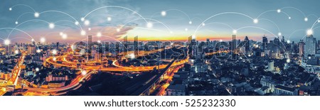 Network and Connection technology concept with Bangkok Expressway top view in panorama at sunrise, Thailand. Royalty-Free Stock Photo #525232330