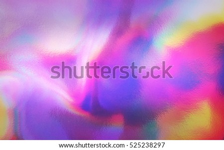 Photo of an abstract colorful holographic futuristic texture.