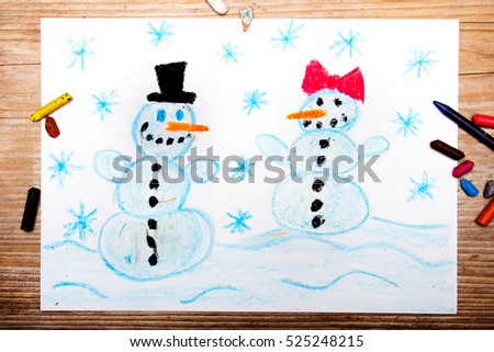 colorful drawing: happy snowman couple