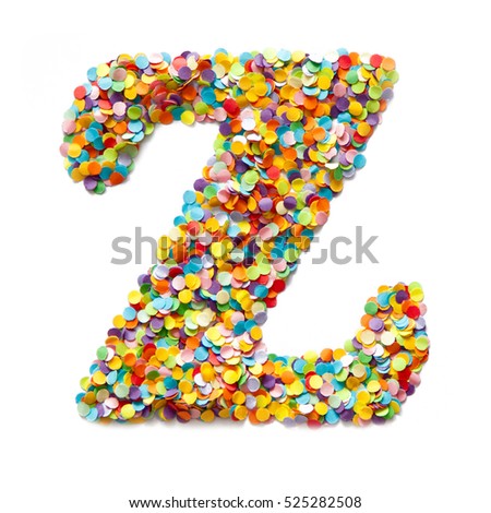 The letter Z is laid out colored confetti. White background.