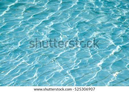 Rippled water detail in swimming pool.