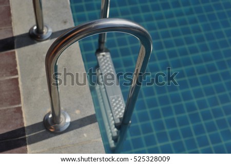 water swimming pool with sunny reflections