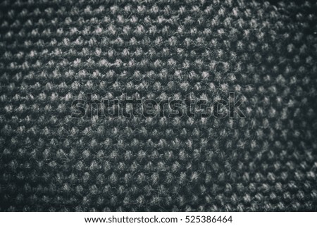 The fabric is thick and coarse vintage style for texture and background.