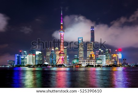 Night shot with Shanghai skyline along the Huangpu river, China.

