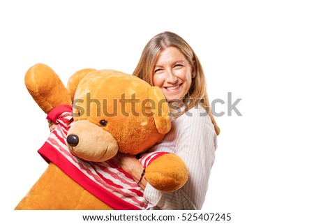 senior beautiful woman with a teddy bear