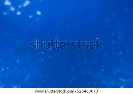 Abstract Bokeh background blue glitter Christmas.