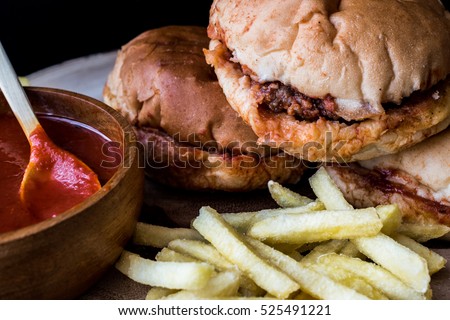 Turkish Wet Burger with sauce and potatoes. / islak hamburger