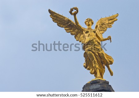 The Angel of Independence against the sky in Mexico City, Mexico. Royalty-Free Stock Photo #525511612